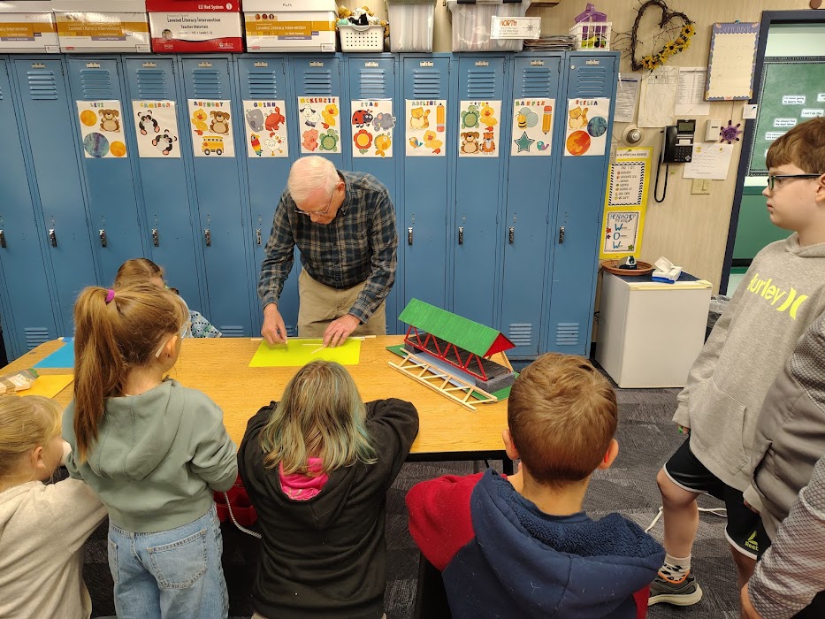 Marcel Beaudry showing students how to begin the process of making a truss